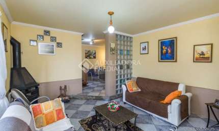 Casa com 3 quartos à venda na Rua Ângelo Passuelo, 420, Vila Nova, Porto Alegre, 296 m2 por R$ 499.000