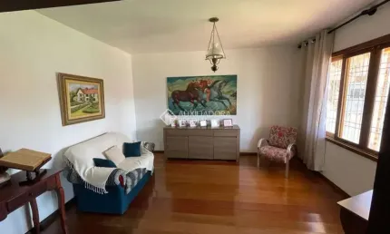 Casa com 3 quartos à venda na Rua Doutor Mário Totta, 1325, Tristeza, Porto Alegre, 363 m2 por R$ 850.000