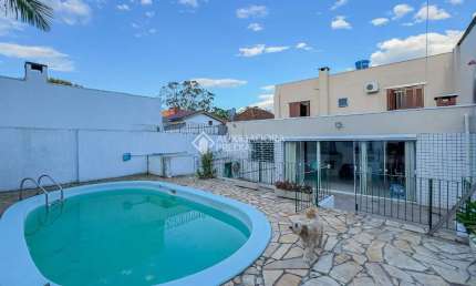 Casa com 4 quartos à venda na Rua Dom Pedrito, 317, Passo da Areia, Porto Alegre, 310 m2 por R$ 1.150.000
