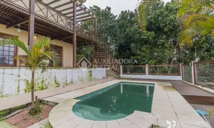 Casa com 4 quartos à venda na Rua Chiriguano, 265, Vila Assunção, Porto Alegre, 393 m2 por R$ 1.490.000