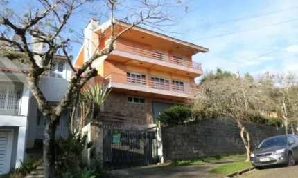Casa com 4 quartos à venda na Rua Caeté, 1047, Vila Assunção, Porto Alegre, 323 m2 por R$ 1.800.000