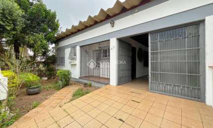 Casa com 3 quartos à venda na Rua Honorato Toniolo, 47, Vila Operária, Porto Alegre, 200 m2 por R$ 560.000