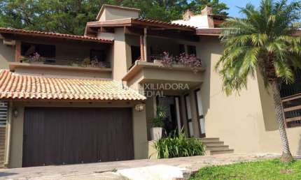 Casa em condomínio fechado com 3 quartos à venda na Rua Edgar Luiz Schneider, 510, Jardim Isabel, Porto Alegre, 310 m2 por R$ 1.330.000
