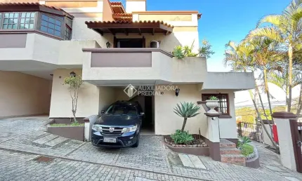 Casa em condomínio fechado com 3 quartos à venda na Avenida Wenceslau Escobar, 3714, Vila Conceição, Porto Alegre, 136 m2 por R$ 590.000