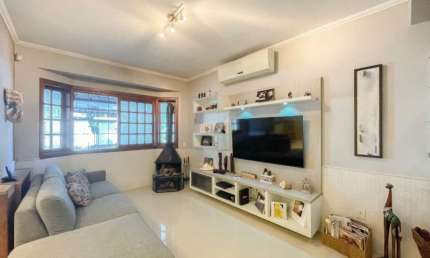 Casa com 3 quartos à venda na Avenida Copacabana, 336, Tristeza, Porto Alegre, 119 m2 por R$ 889.000