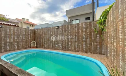 Casa com 3 quartos à venda na Rua Michael Motta Seelig, 36, Hípica, Porto Alegre, 133 m2 por R$ 450.000