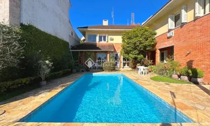 Casa com 5 quartos à venda na Rua Dona Lida Monteiro, 80, Teresópolis, Porto Alegre, 445 m2 por R$ 1.500.000