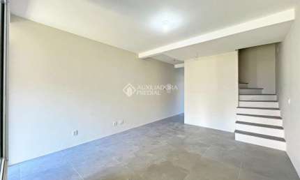 Casa em condomínio fechado com 3 quartos à venda na Rua Itacyr Rossi, 33, Guarujá, Porto Alegre, 122 m2 por R$ 559.000
