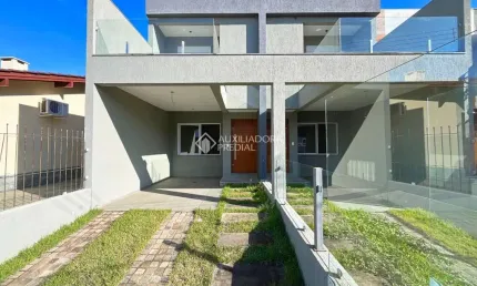 Casa em condomínio fechado com 3 quartos à venda na Rua Itacyr Rossi, 31, Guarujá, Porto Alegre, 122 m2 por R$ 560.000