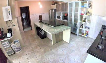 Casa em condomínio fechado com 5 quartos à venda na Rua Otelo Rosa, 525, Ipanema, Porto Alegre, 404 m2 por R$ 750.000