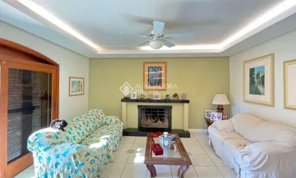 Casa com 4 quartos à venda na Rua Burum, 30, Vila Assunção, Porto Alegre, 291 m2 por R$ 1.090.000