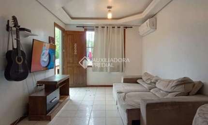 Casa com 2 quartos à venda na Avenida Alcibiades Martins da Rocha, 1861, Vila Operária, Porto Alegre, 63 m2 por R$ 245.000