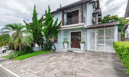 Casa em condomínio fechado com 3 quartos à venda na Avenida Edgar Pires de Castro, 540, Hípica, Porto Alegre, 220 m2 por R$ 895.000