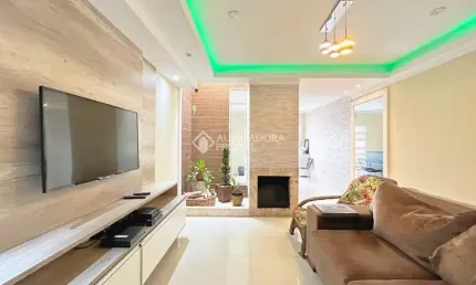 Casa com 3 quartos à venda na Rua Danton Krás Borges, 53, Guarujá, Porto Alegre, 166 m2 por R$ 565.000