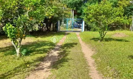 Terreno em condomínio fechado à venda na Rua Dona Mariana, 812, Restinga, Porto Alegre, 122 m2 por R$ 450.000