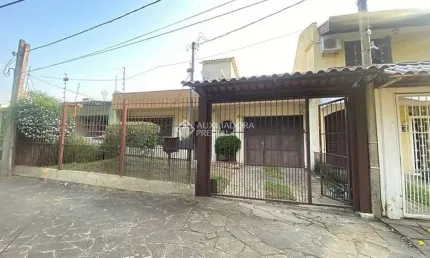 Casa com 3 quartos à venda na Rua Márcio Dias, 530, Nonoai, Porto Alegre, 120 m2 por R$ 520.000