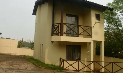 Casa em condomínio fechado com 3 quartos à venda na Avenida Vicente Monteggia, 1669, Cavalhada, Porto Alegre, 208 m2 por R$ 580.000