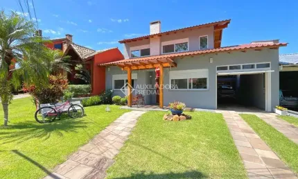 Casa em condomínio fechado com 3 quartos à venda na Avenida Juca Batista, 1200, Cavalhada, Porto Alegre, 250 m2 por R$ 1.700.000