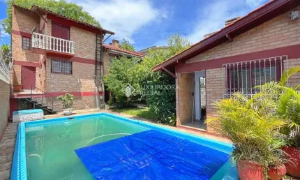 Casa com 3 quartos à venda na Travessa Nova Trento, 407, Tristeza, Porto Alegre, 240 m2 por R$ 850.000