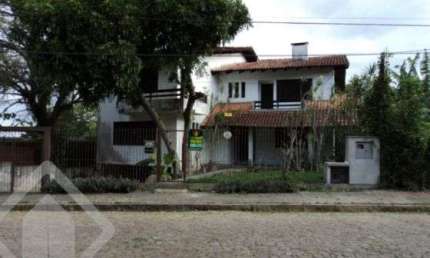 Casa com 4 quartos à venda na Rua Professor Xavier Simões, 253, Tristeza, Porto Alegre, 520 m2 por R$ 1.249.000