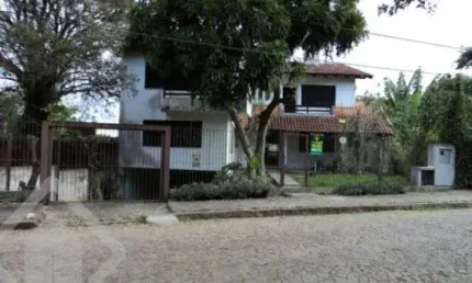 Casa com 4 quartos à venda na rua professor xavier simões, 253, tristeza, porto alegre, 520 m2 por r$ 1.249.000