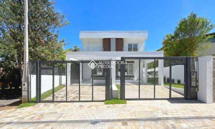 Casa com 3 quartos à venda na Rua Padre João Batista Reus, 366, Vila Conceição, Porto Alegre, 284 m2 por R$ 1.090.000