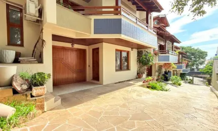 Casa em condomínio fechado com 3 quartos à venda na Rua Jaguari, 910, Cristal, Porto Alegre, 174 m2 por R$ 780.000