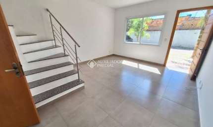 Casa em condomínio fechado com 2 quartos à venda na Rua Coronel Frederico Carlos Gomes, 110, Vila Nova, Porto Alegre, 62 m2 por R$ 295.000