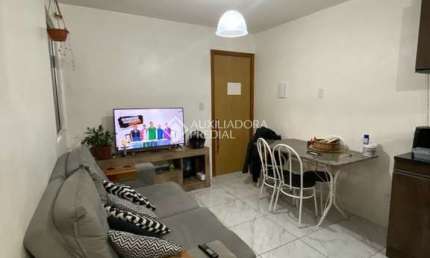 Apartamento com 2 quartos à venda na Rua Capitão Pedroso, 560, Restinga, Porto Alegre, 38 m2 por R$ 128.000