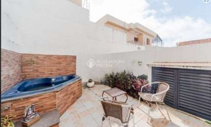 Casa em condomínio fechado com 3 quartos à venda na Rua Padre João Batista Reus, 2133, Vila Conceição, Porto Alegre, 152 m2 por R$ 550.000