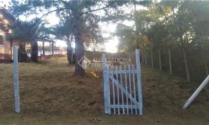 Terreno em condomínio fechado à venda na Rua dos Ipês Roxo, 21, Tarumã, Viamão, 446 m2 por R$ 150.000