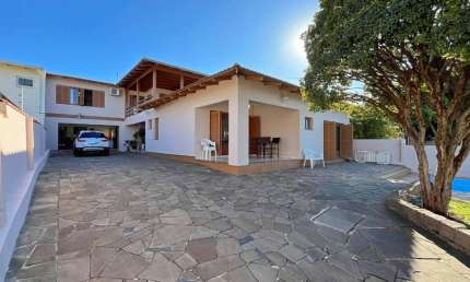 Casa com 4 quartos à venda na Rua Atílio Supertti, 623, Vila Nova, Porto Alegre, 400 m2 por R$ 970.001