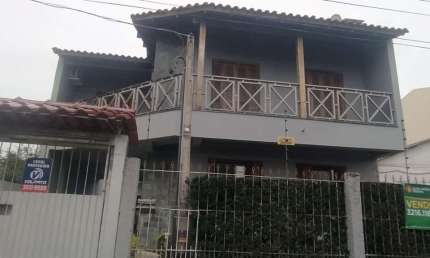 Casa em condomínio fechado com 4 quartos à venda na Rua Monte Arraes, 210, Nonoai, Porto Alegre, 317 m2 por R$ 954.000