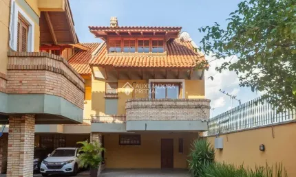 Casa em condomínio fechado com 3 quartos à venda na Avenida Coronel Marcos, 2171, Pedra Redonda, Porto Alegre, 171 m2 por R$ 750.000