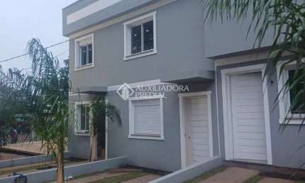 Casa em condomínio fechado com 2 quartos à venda na Rua Frederico Etzberger, 650, Nonoai, Porto Alegre, 54 m2 por R$ 370.000
