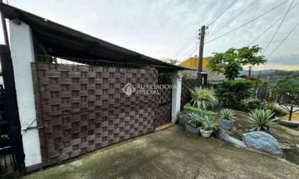 Casa com 3 quartos à venda na Rua Bazilio Pellin Filho, 1650, Tristeza, Porto Alegre, 111 m2 por R$ 300.000