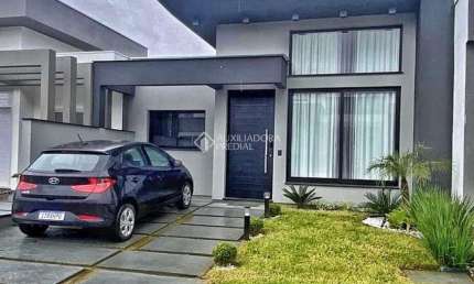 Casa em condomínio fechado com 3 quartos à venda na Estrada Caminho do Meio, 2815, Vila Augusta, Viamão, 88 m2 por R$ 699.000