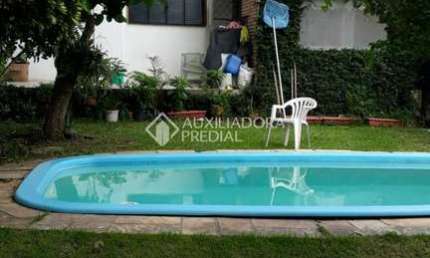 Casa em condomínio fechado com 3 quartos à venda na Beco Domience Silva, 126, Ponta Grossa, Porto Alegre, 250 m2 por R$ 350.000