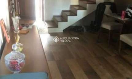 Casa em condomínio fechado com 3 quartos à venda na Avenida Orleaes, 105, Guarujá, Porto Alegre, 196 m2 por R$ 470.000