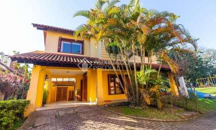 Casa em condomínio fechado com 3 quartos à venda na Rua Luís Felipe Monmany, 101, Espírito Santo, Porto Alegre, 132 m2 por R$ 650.000