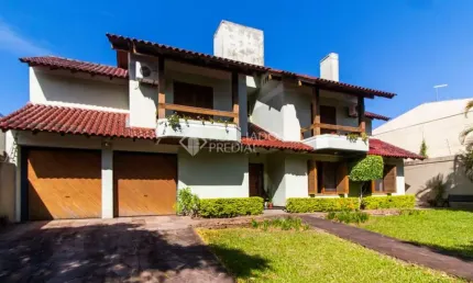 Casa em condomínio fechado com 3 quartos à venda na Travessa Nova Trento, 354, Tristeza, Porto Alegre, 430 m2 por R$ 1.400.000