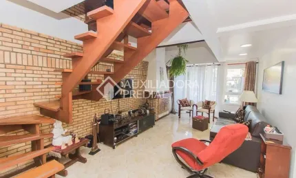 Casa em condomínio fechado com 3 quartos à venda na Avenida Copacabana, 358, Tristeza, Porto Alegre, 177 m2 por R$ 1.195.000