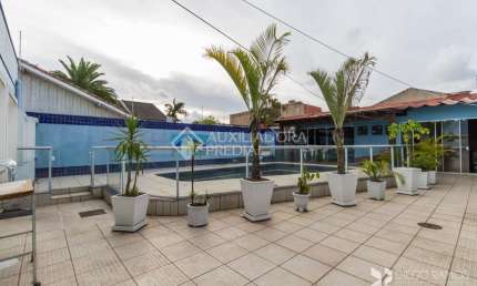 Casa em condomínio fechado com 3 quartos à venda na Rua Engenheiro Tito Marques Fernandes, 322, Ipanema, Porto Alegre, 313 m2 por R$ 950.000