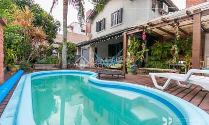 Casa em condomínio fechado com 3 quartos à venda na Estrada João Passuelo, 1060, Vila Nova, Porto Alegre, 230 m2 por R$ 520.000