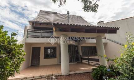 Casa em condomínio fechado com 4 quartos à venda na Rua Doutor Castro de Menezes, 943, Vila Assunção, Porto Alegre, 299 m2 por R$ 1.290.000