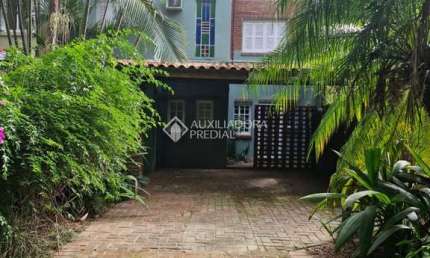 Casa em condomínio fechado com 3 quartos à venda na Rua dos Guaranis, 154, Espírito Santo, Porto Alegre, 220 m2 por R$ 690.000