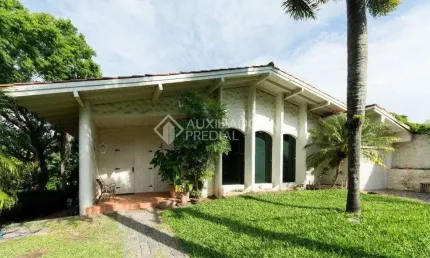 Casa em condomínio fechado com 3 quartos à venda na Rua Coroados, 526, Vila Assunção, Porto Alegre, 350 m2 por R$ 1.270.000