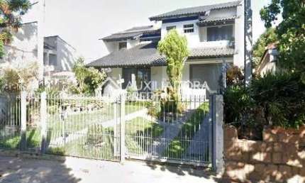 Casa com 5 quartos à venda na Rua Doutor Mário Totta, 2087, Tristeza, Porto Alegre, 379 m2 por R$ 1.790.000