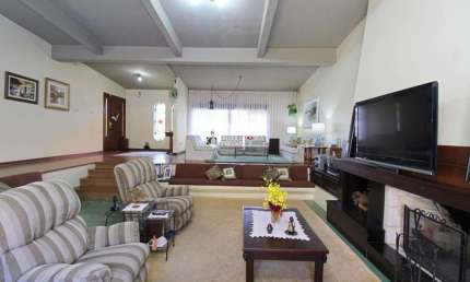 Casa com 4 quartos à venda na Rua Jacipuia, 201, Guarujá, Porto Alegre, 464 m2 por R$ 1.400.000