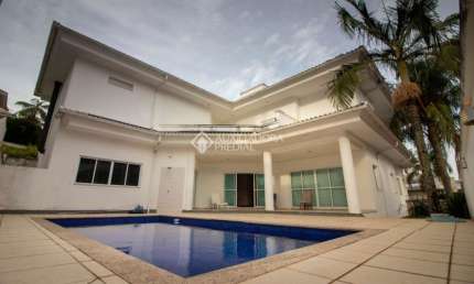Casa em condomínio fechado com 4 quartos à venda na Rodovia Haroldo Soares Glavan, 929, Cacupé, Florianópolis, 484 m2 por R$ 3.700.000